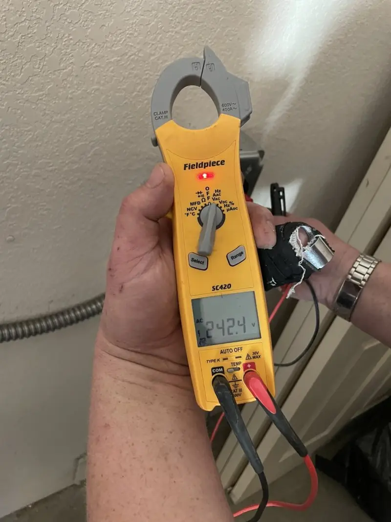 Voltage testing with clamp meter during Circuit Breaker Repair in Claremore